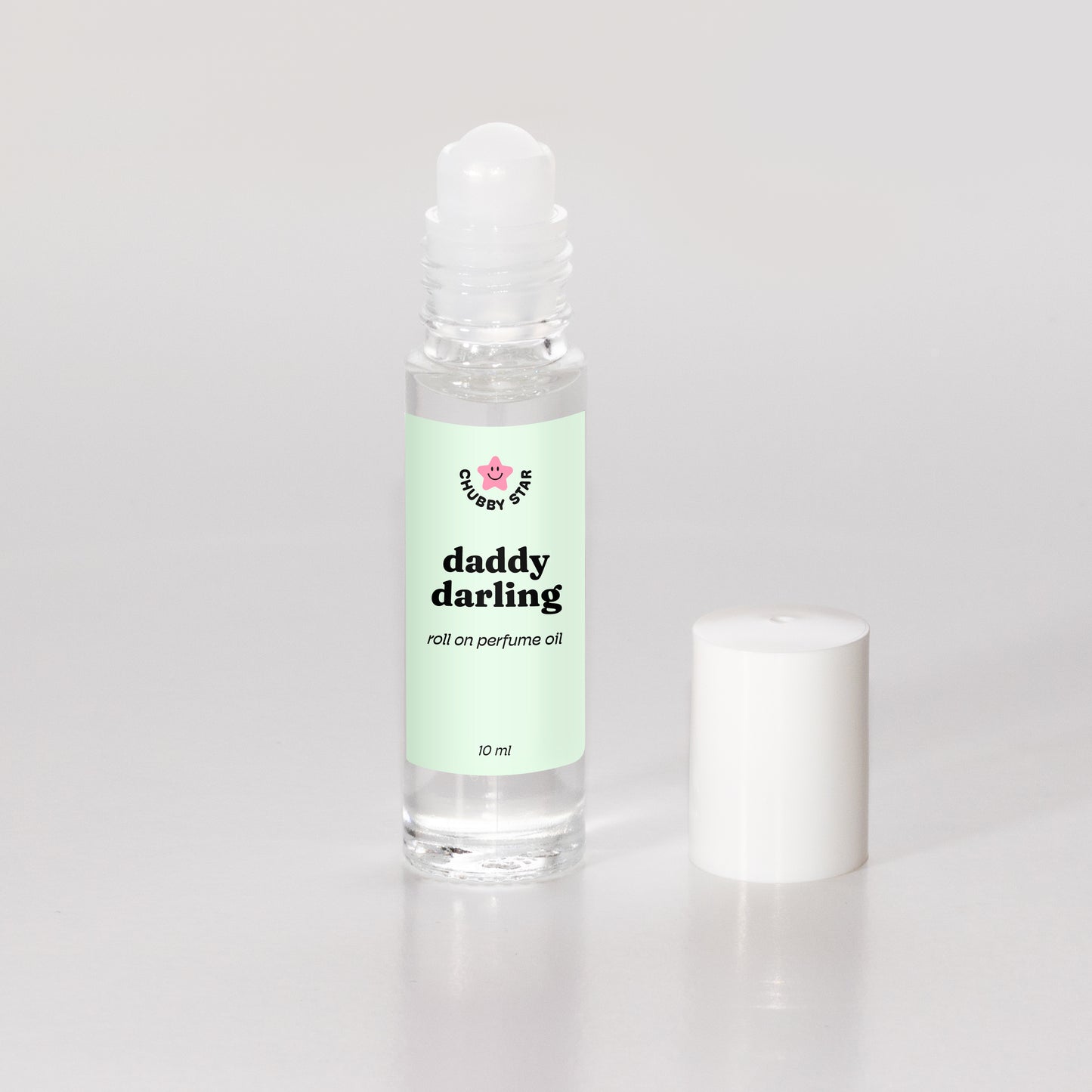 daddy darling father figure scented roll on perfume oil on a white background