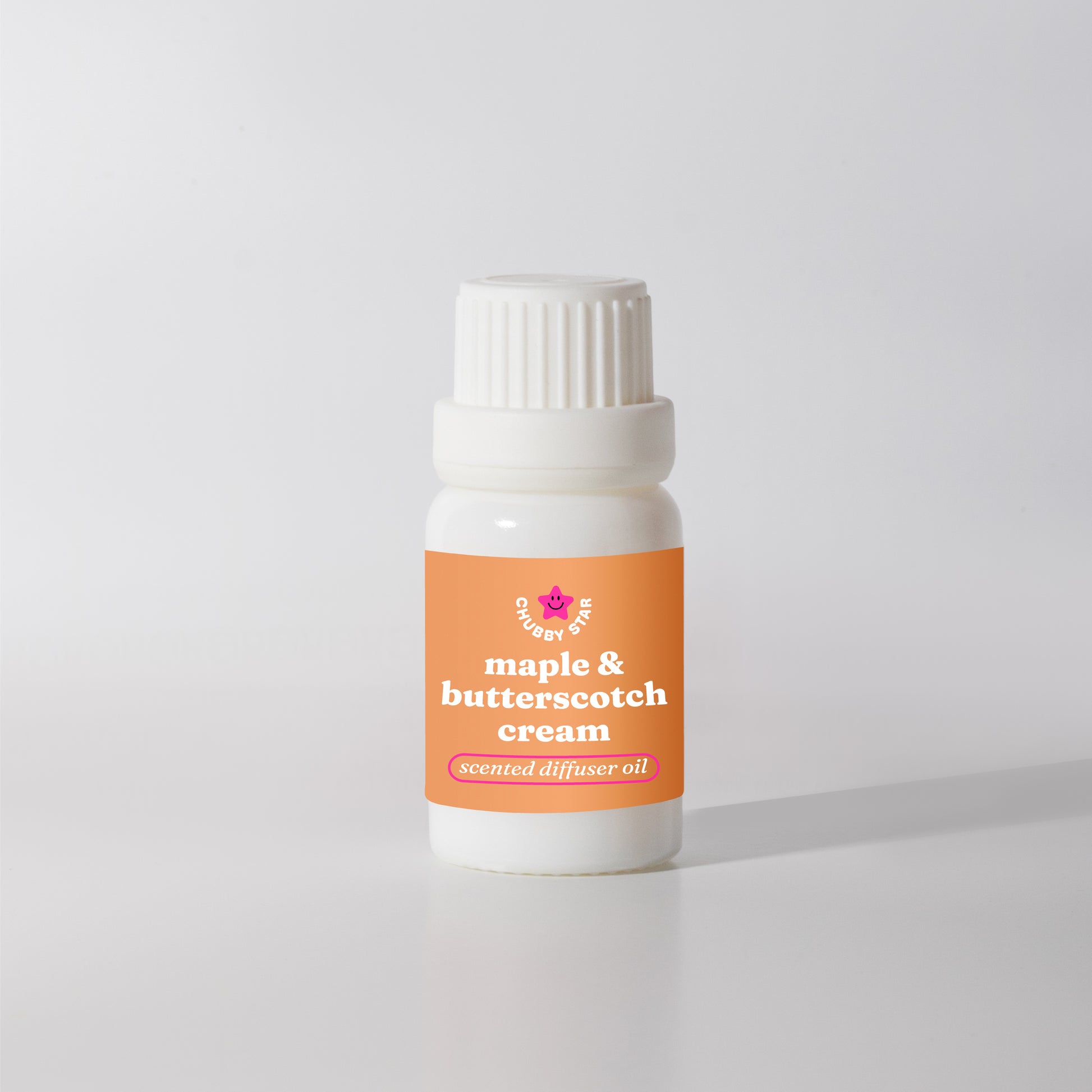 maple butterscotch cream scented diffuser oil on a white background