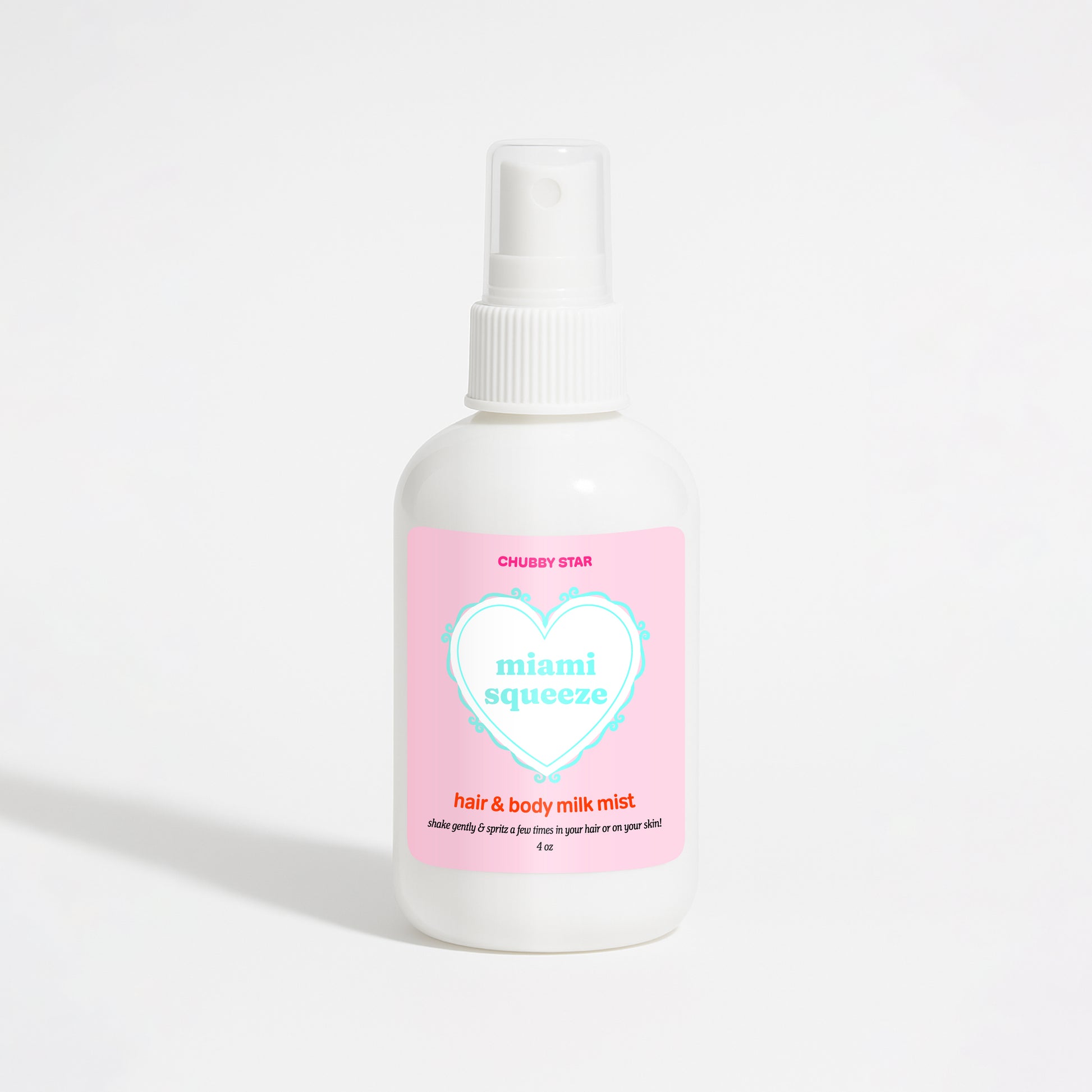 A white plastic spray bottle of Chubby Star Miami Squeeze Miami Nectar scented hair & body milk spray with a pink label, set against a plain white background.