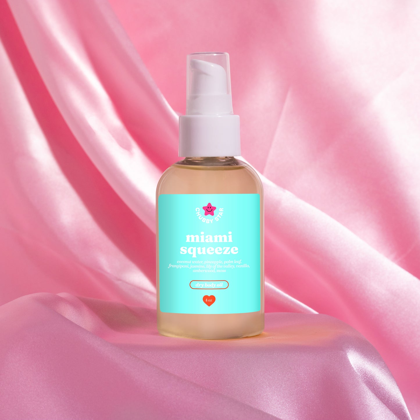 Miami squeeze, a miami nectar dupe scented body oil shown on a pink background