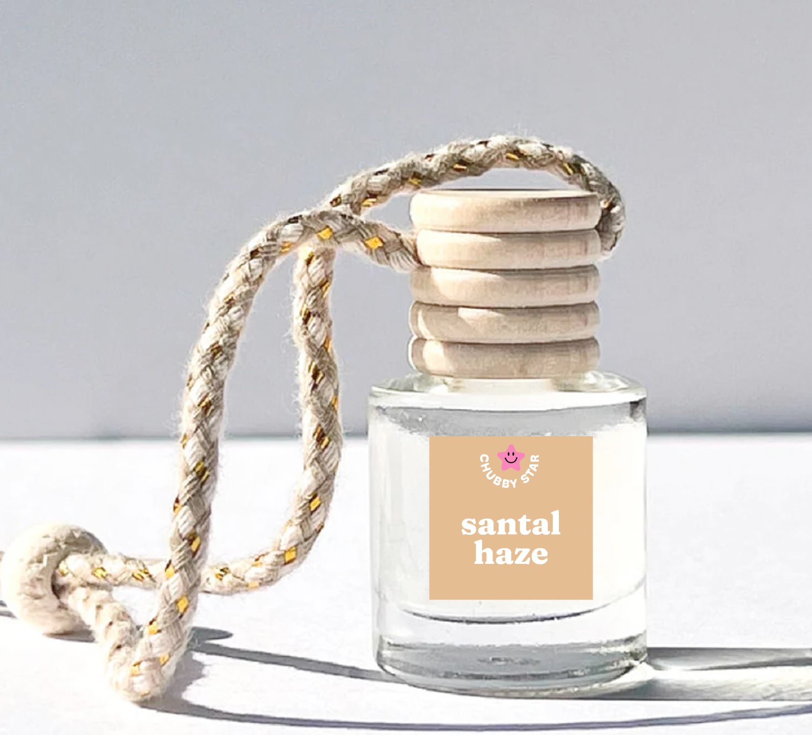 Santal Haze scented car freshener compare to Le Labo Santal 33 scent with notes of papyrus, iris, leather, cedar, amber, and sandalwood. It's a smoky, soft, skin like scent that will make your car smell like the iconic perfume.