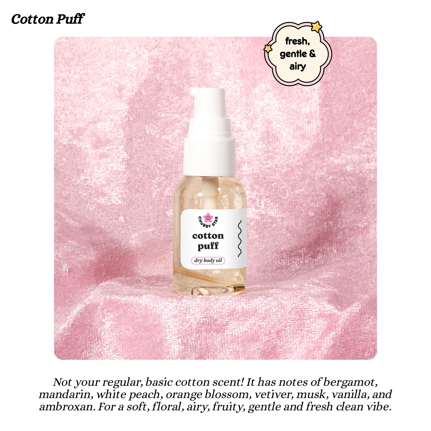 Bottle of Cotton Puff dry body oil on a pink textured background
