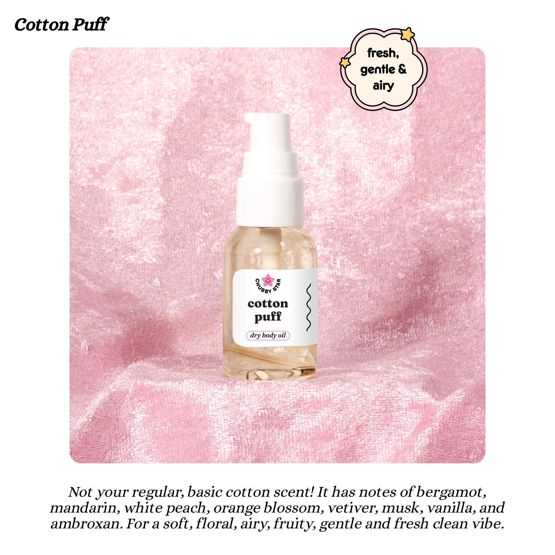 Bottle of Cotton Puff dry body oil on a pink textured background