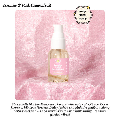 Bottle of Jasmine & Pink Dragonfruit dry body oil on a pink marble background