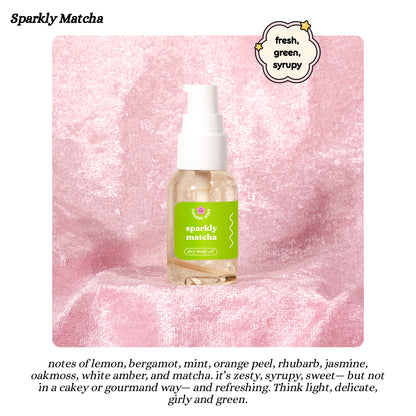 Bottle of 'Sparkly Matcha' body oil on a pink textured background with descriptive text below.