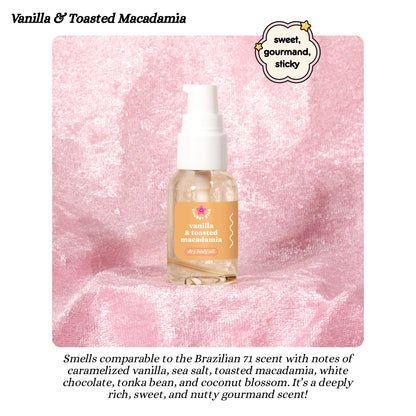Bottle of Vanilla & Toasted Macadamia 1 oz dry body oil on a pink marble background